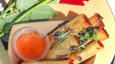 Malaya Eats' lumpia: a Filipino fried egg roll with a side of sweet chili sauce.
